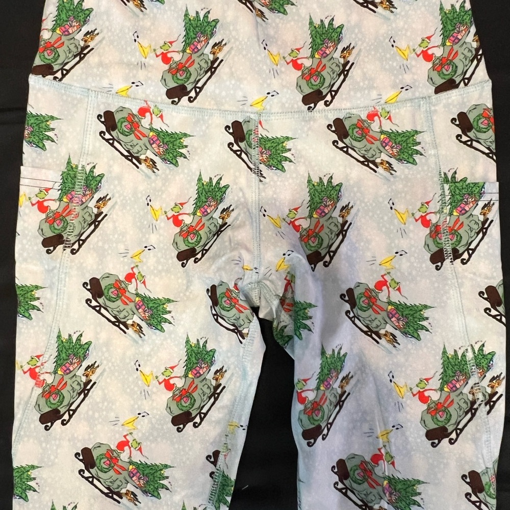 Spread the Holiday Cheer wearing a pair of The Grinch Leggings! - Picture 5 of 6